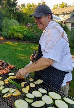 Recovery Kitchen Chef, Jamie Parry, on the grill (photo by Rachel Weisman)